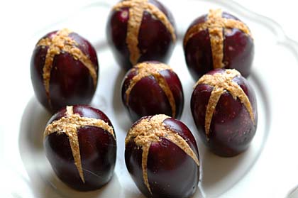 Purple brinjals stuffed with roasted dal- coconut-cashew paste