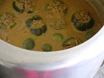 Stuffed brinjal curry in pressure cooker after one whistle