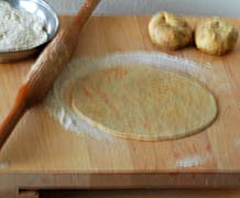  Rolling out chapati in round shape