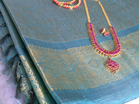Kanchi Pattu Saree and Ruby Necklace