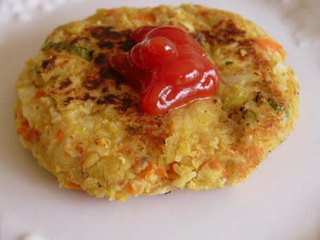 Toordal-Almond burgers with ketchup on top