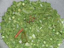 SautÃ¯Â¿Â½ing the mint masala with onions and peas