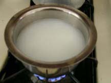 Boiling the water(milk) for Ragi malt