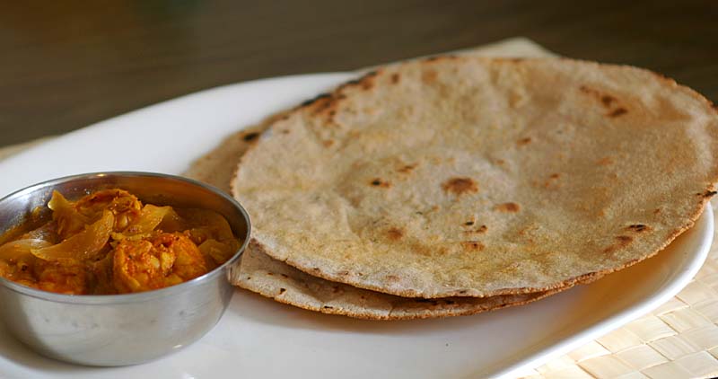 Sorghum roti (Jonna Rotte, Jowar roti) with curry
